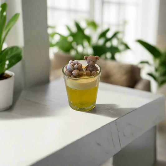 Exklusivt doftljus i glas, handgjort med naturligt bivax och en varm honungsdoft – Dofty
